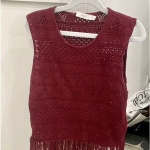 Beautiful maroon knit crop shirt with fringe bottom